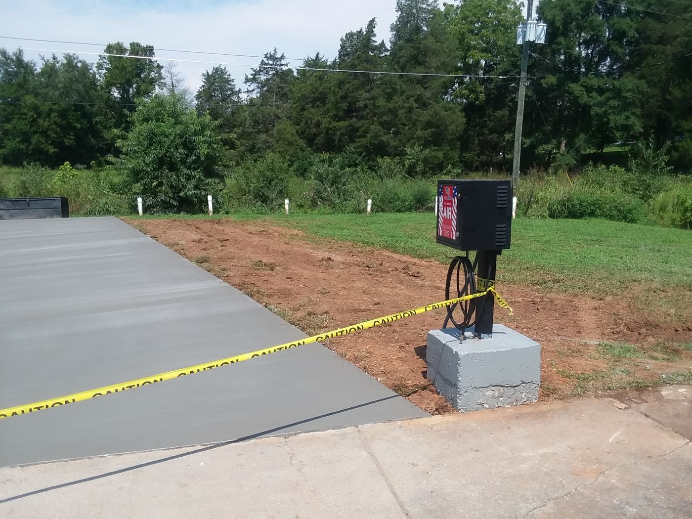 New commercial approach slab with utility pedestal